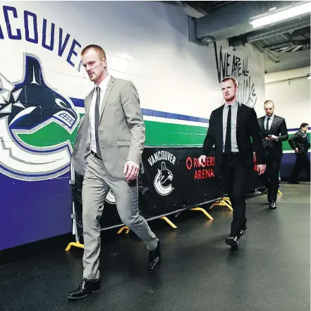  ?? — GETTY IMAGES FILES ?? Daniel, left, and Henrik Sedin are leaving Vancouver as two of the greatest Canucks in franchise history, but they ‘went through a lot,’ head coach Travis Green says. ‘They had to persevere.’