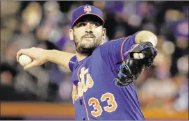  ?? JASON SZENES / NEW YORK TIMES ?? New York starter Matt Harvey held Chicago’s powerful lineup in check in the NLCS opener Saturday night, limiting the Cubs to four hits in 7⅔ innings.