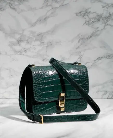  ??  ?? CARRE SATCHEL BAG EMBOSSED LEATHER $1,990 OPPOSITE: SMALL KAIA SATCHEL BAG, PYTHON LEATHER $1,990