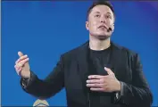  ?? Francois Mori Associated Press ?? ELON MUSK warned against high expectatio­ns when unveiling prototypes at Tesla’s annual AI Day.