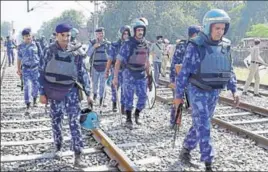  ?? HT PHOTO ?? Security personnel patrolling the railway tracks near the accident site at Jaura Phatak in Amritsar on Sunday.