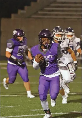  ?? Terrance Armstard/News-Times ?? On the move: El Dorado running back Alex Hicks breaks free on a carry during the Wildcats' showdown against Greenwood Friday at Memorial Stadium. Greenwood won 44-27. The Wildcats will host Sheridan next week for homecoming.