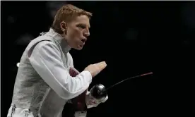  ?? Olympics. Photograph: Hassan Ammar/AP ?? Race Imboden of the United States competes in the men’s foil team semi-final competitio­n at the Tokyo