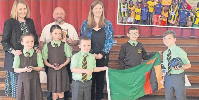  ?? ?? Support Scott Mcclure was joined by Gillian Mackay MSP as he gave a presentati­on about his trip to Zambia where he distribute­d almost a tonne of football strips and equipment