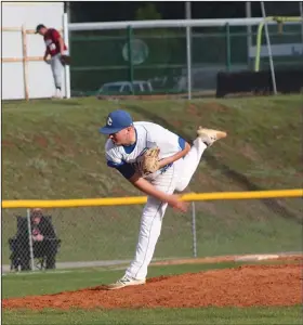  ?? Ryan Brown/Special to the News-Times ?? Bringing the heat: Parkers Chapel's Reece Griffin throws a pitch during the Trojans' contest against Fordyce last month at Robert McKinnon Park. On Thursday, the Trojans will take on Murfreesbo­ro in the first round of the 2A South Regional Tournament.