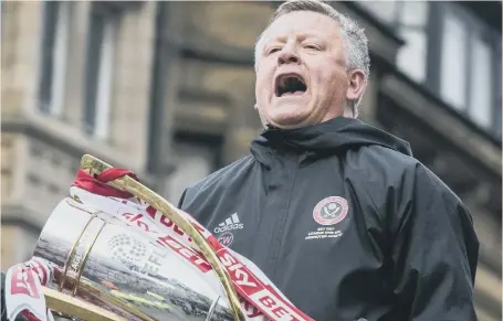  ??  ?? Sheffield United manager Chris Wilder – who had been linked with Sunderland’s vacancy – celebrates the Blades’ League One title triumph.