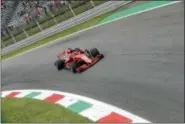  ?? LUCA BRUNO — THE ASSOCIATED PRESS ?? Ferrari driver Sebastian Vettel of Germany steers his car during a free practice at the Monza racetrack, in Monza, Italy, Friday. The Formula One race will be held on Sunday.