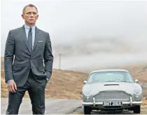  ?? ?? iNow Time to Drive: Daniel Craig as Bond – with his silver Aston Martin DB5 – in Skyfall (2012)