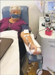  ?? St. Vincent's Medical Center / Contribute­d ?? St. Vincent's Medical Center nurse Susan Goncalves donated her plasma on Apr. 20 at a center in Rhode Island. Goncalves is a survivor of COVID-19.