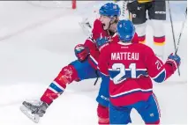  ?? PAUL CHIASSON/THE CANADIAN PRESS ?? Canadiens’ Mike McCarron, left, celebrates his first NHL goal with teammate Stefan Matteau.