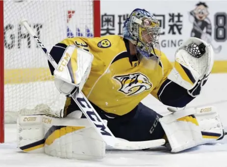  ?? MARK HUMPHREY/THE ASSOCIATED PRESS ?? Nashville goalie Pekka Rinne was nearly unbeatable in the first round of the playoffs and still leads most goaltendin­g statistics in the post-season.