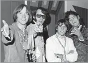  ?? Ray Howard Associated Press ?? THE ‘PREFAB FOUR’ Peter Tork, left, Michael Nesmith, Davy Jones and Micky Dolenz of the Monkees, shown in 1967.