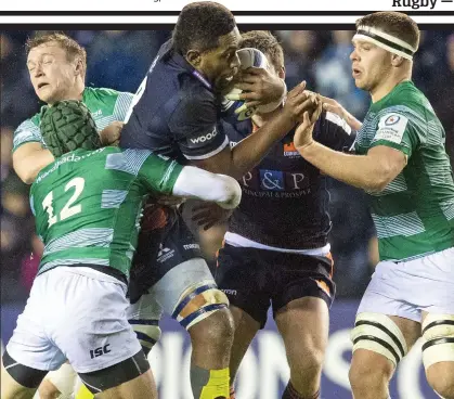  ??  ?? Rampage: Viliame Mata tries to battle his way past the Falcons at Murrayfiel­d last weekend