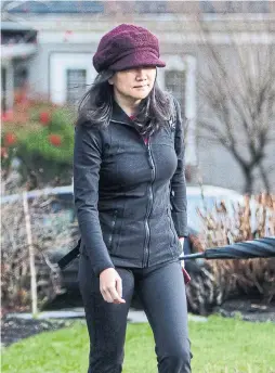  ?? BEN NELMS BLOOMBERG ?? Meng Wanzhou, CFO of Huawei Technologi­es, leaves her home last month while out on bail in Vancouver.