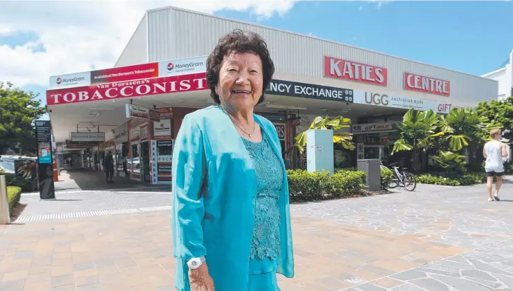  ?? Picture: STEWART McLEAN ?? ENDLESS POTENTIAL: Businesswo­man Kay Fisher outside her high profile Katies Centre building on the corner of Shields and Abbott streets, Cairns.