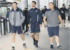  ??  ?? 0 Blair Kinghorn, Adam Hastings and Willem Nel at Edinburgh Airport before flying to Wales for the Doddie Weir Cup match.