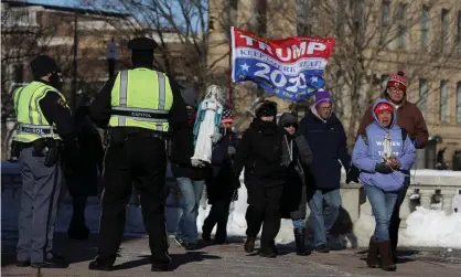  ?? Photograph: Daniel Acker/ Reuters ?? Protestors outside Wisconsin’s state capitol in Madison as the state’s electors cast their votes, December 2020.