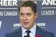  ?? JACK BOLAND / POSTMEDIA NEWS ?? Tory Leader Andrew Scheer asked Tony Clement to leave caucus because of online allegation­s of creepy behaviour.