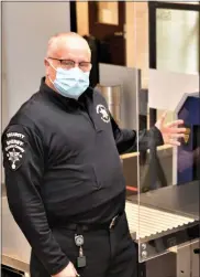  ?? SUBMITTED PHOTO ?? Chester County Sheriff’s Office, Security Officer Roy Kofroth, who owns a glass company, volunteere­d to construct Plexiglas shields to protect his colleagues as well as the public.