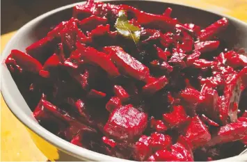  ?? MARY ANNE MOHANRAJ ?? If you can't find curry leaves, you can substitute them with lime zest and basil leaves in this recipe for beet curry.