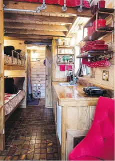  ?? JEFFREY FREEMAN ?? The inside of Caravan’s tiny house Caboose in Portland is warm and welcoming.