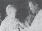  ?? ARCHIVES ?? Dr. Charles Brown, the columnist’s father- in- law, immunizes his son Bob against polio in 1954.