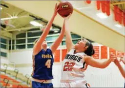  ?? M JOHN MCCONNEY — FOR DIGITAL FIRST MEDIA ?? Perkiomen Valley’s Katie Hurd (22) blocks a shot by Downingtow­n East’s Caroline Brennan (4) Wednesday.