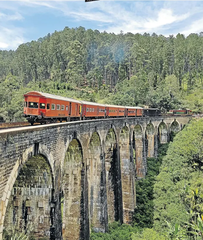  ?? Pictures: Richard Holmes ?? SWEET DESTINATIO­N The train from Colombo to Kandy crosses a magnificen­t viaduct on its journey to the hills.