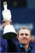  ?? (Reuters) ?? JORDAN SPIETH celebrates with the Claret Jug yesterday after winning The Open Championsh­ip at Royal Birkdale, the third career major victory for the 23-year-old American.