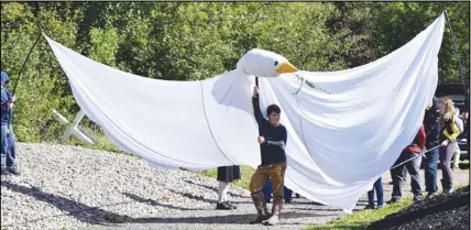  ?? CODY MCEACHERN/TRURO DAILY NEWS ?? At the end of the Day of Peace ceremony and play, students stretched out large peace dove puppets and led attendees out of the park. The dove puppets were supplied to the students by Jane Goodall’s Peace Initiative.