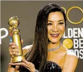  ?? CHRIS PIZZELLO AP ?? Michelle Yeoh won a Golden Globe on Jan. 10 for her work in “Everything Everywhere All at Once.”