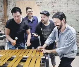  ?? Kirk McKoy Los Angeles Times ?? THE COLLABORAT­ORS of the first show in the “Musical Interventi­ons” series get in tune: Sergio Mendoza, from left, Josh Kun, Camilo Lara and Alberto Lopez.