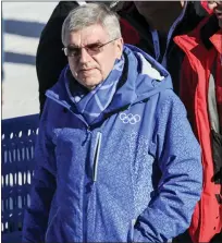  ?? MARCO TROVATI — THE ASSOCIATED PRESS ?? IOC (Internatio­nal Olympic Committee) president Thomas
Bach walks in the finish area of the men’s World Championsh­ip downhill, in Courchevel, France, Sunday. He defended the IOC’S position of finding a way for athletes from Russia and Belarus not supporting the Ukraine war to still compete in the 2024Games.