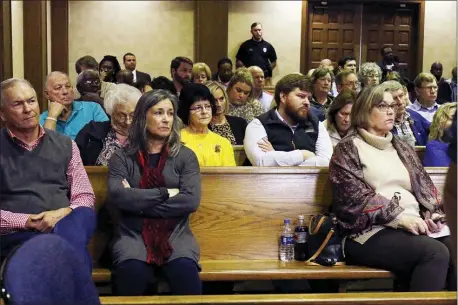  ?? ROGELIO V. SOLIS — THE ASSOCIATED PRESS ?? Community residents listen as a judge grants bail Curtis Flowers, whose murder conviction was overturned by the U.S. Supreme Court for racial bias, Monday in Winona, Miss. Flowers is being released from custody for the first time in 22 years. Flowers, has been tried six times for murder in the 1996shooti­ng deaths of four people in a furniture store.