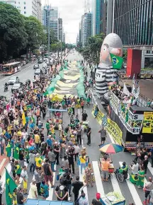  ?? MARCELO D. SANTS/FRAMEPHOTO - 24/1/2018 ?? Nas ruas. Manifestan­tes pedem prisão de Lula em SP