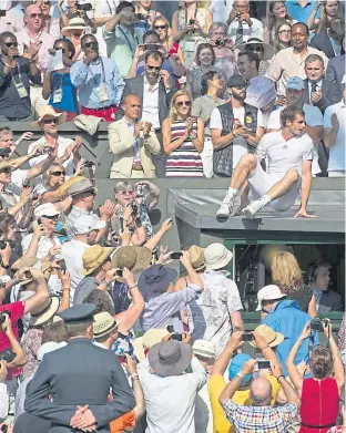  ??  ?? Andy climbs up to the Centre Court players’ box after 2013 Wimbledon final but mum isn’t there