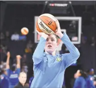  ?? Sam Wasson / Getty Images ?? The Chicago Sky’s Katie Lou Samuelson warms up before a game against the Minnesota Lynx in 2019.