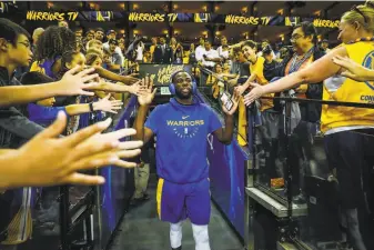  ?? Gabrielle Lurie / The Chronicle ?? Left: The Warriors’ Draymond Green, like Bosa, never got the memo about a player coming into a league quietly.