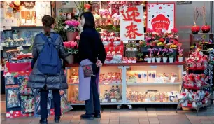  ?? — Reuters ?? Japan’s nationwide core consumer price index rose 0.9 per cent in November from a year earlier, marking the 11th straight month of gains.
