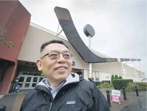  ?? PHOTOS: ARLEN REDEKOP ?? Ray Zhang is owner of the BCHL’s Cowichan Capitals, which he bought last year for “around $1 million.” The team’s home in Duncan, the Island Savings Centre, is home to the world’s largest hockey stick and a giant puck, both relics from the Canada...