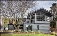  ?? (TNS/The Seattle Times/Steve Ringman/) ?? “As we considered that beautiful Japanese maple just outside the back basement, we realized it would be the perfect focal point for a master suite tucked under the upper-floor addition, creating a rear courtyard that both floors could enjoy,” says architect Julie Campbell.