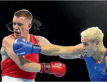  ?? GETTY IMAGES ?? David Nyika, right in action during the Commonweal­th Games final last month, has impressed David Higgins, promoter of Joseph Parker.