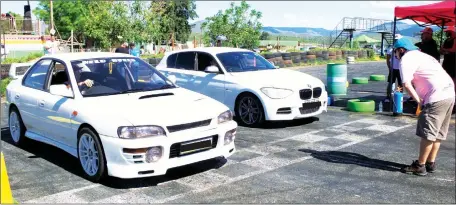  ?? ?? The BMW 1 series about to race against the Subaru while one of the racing officials, Felipe looks on.