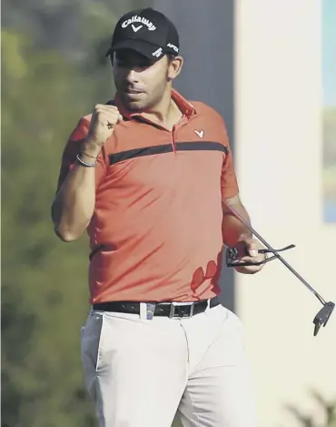  ??  ?? 0 Pablo Larrazabal celebrates his Alfred Dunhill Championsh­ip victory at Leopard Creek.