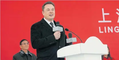  ?? /Reuters ?? Looking East: Elon Musk, chief of Tesla, broke ground for a factory in Shanghai in January in the company’s biggest overseas move yet. Annual production capacity is hoped to be 500,000 in the future.