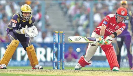  ??  ?? On a day when KKR spilled quite a few catches, Johan Botha held on to one off Sunil Narine to send back KXIP’s Glenn Maxwell after a 22-ball 43. PRATEEK CHOUDHURY/HT PHOTO