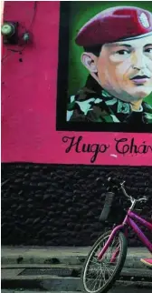  ?? REUTERS ?? Una pared de Altagracia (Nicaragua) con los rostros de Hugo Chávez y Fidel Castro