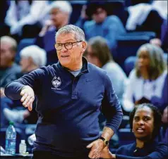  ?? John Peterson / Associated Press ?? UConn coach Geno Auriemma gestures during the team’s game against Creighton on Dec. 28 in Omaha, Neb.