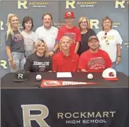  ?? kevin Myrick ?? Rockmart’s Dylan Bailey was joined by his family for his signing with Jacksonvil­le State University’s baseball program on May 10.