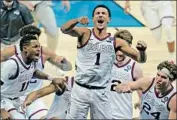  ?? Michael Conroy Associated Press ?? JALEN SUGGS CELEBRATES after he made the winning shot against UCLA. Suggs had 16 points as all of the Gonzaga starters scored in double figures.